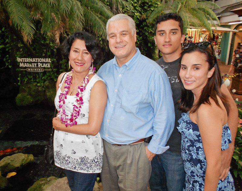 Robert Bard pictured with his wife Lupita Colmenero, son Marcos Suarez and daughter Eileen Suarez.